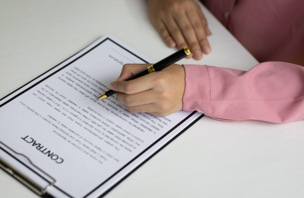 Signing of a real estate contract. Home Insurance and Real Estate
